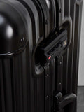 Rock Axel medium aluminium suitcase in black, imported from the UK