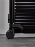 Rock Axel medium aluminium suitcase in black, imported from the UK