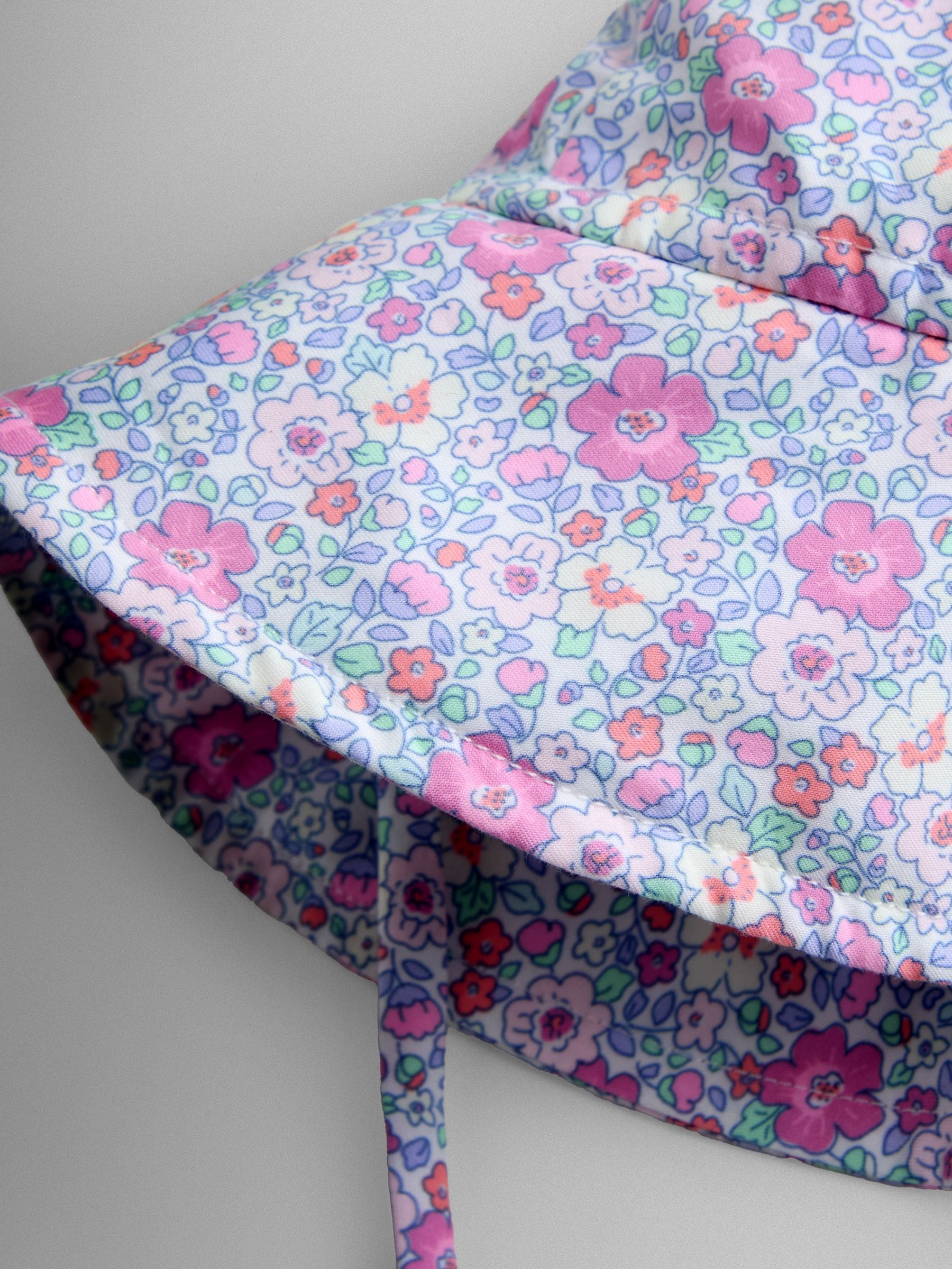 JoJo Maman Bébé coral floppy sun hat (British brand)