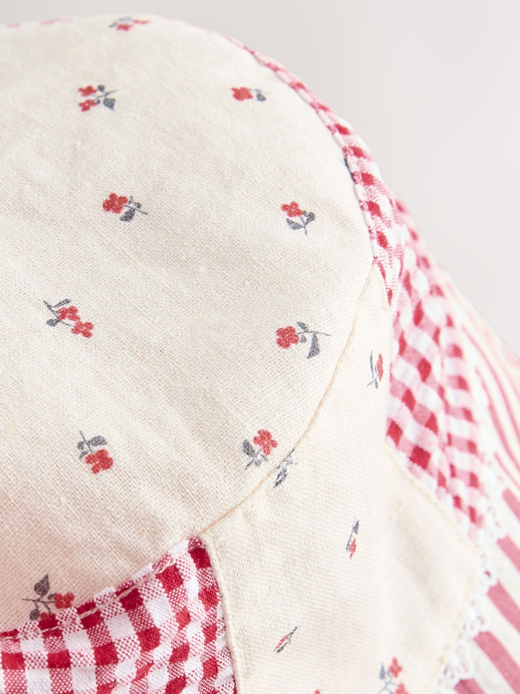 Cream and red patchwork bucket hat, imported from the UK