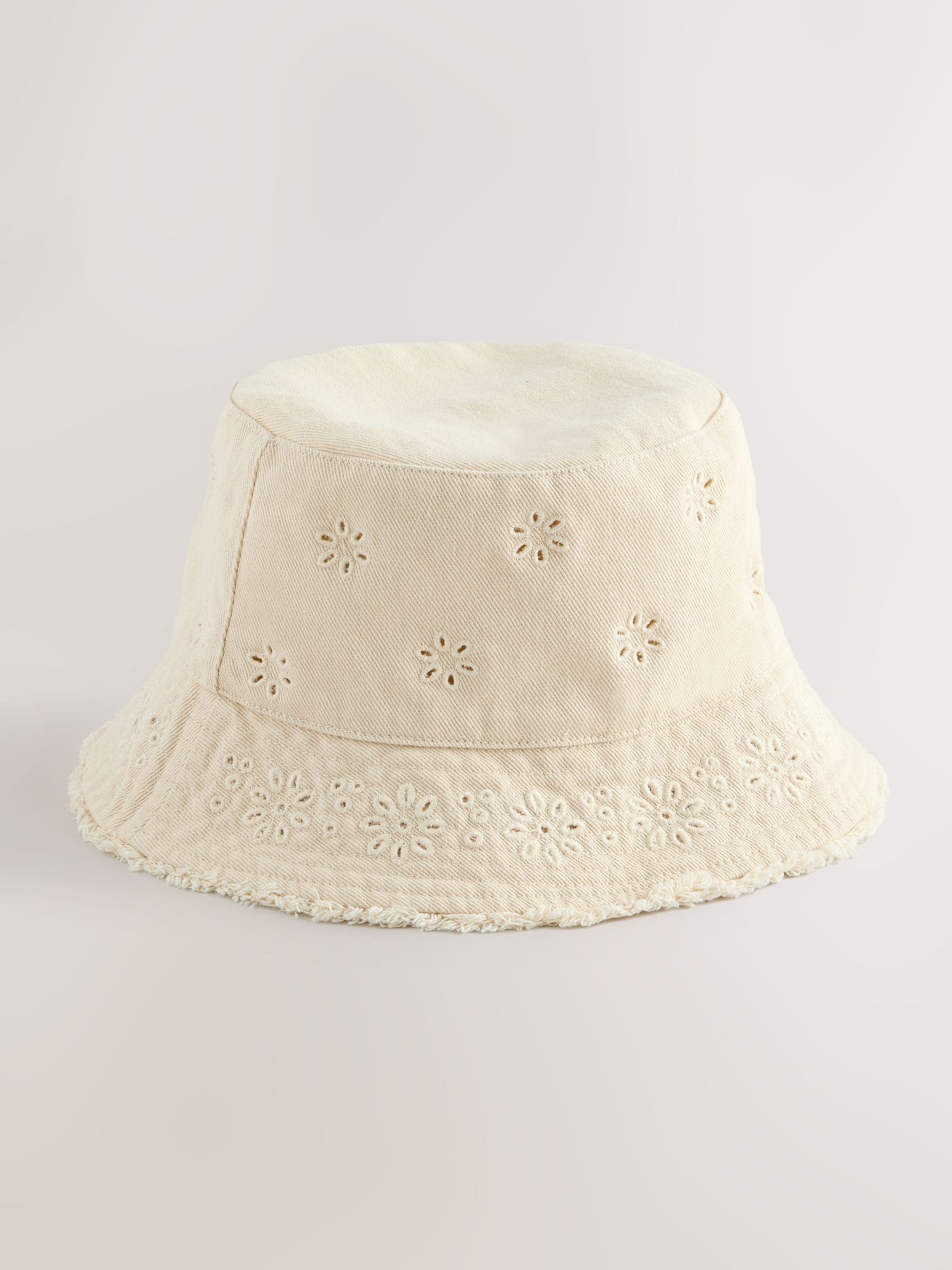 Laser cut embroidered bucket hat for children, imported from the UK
