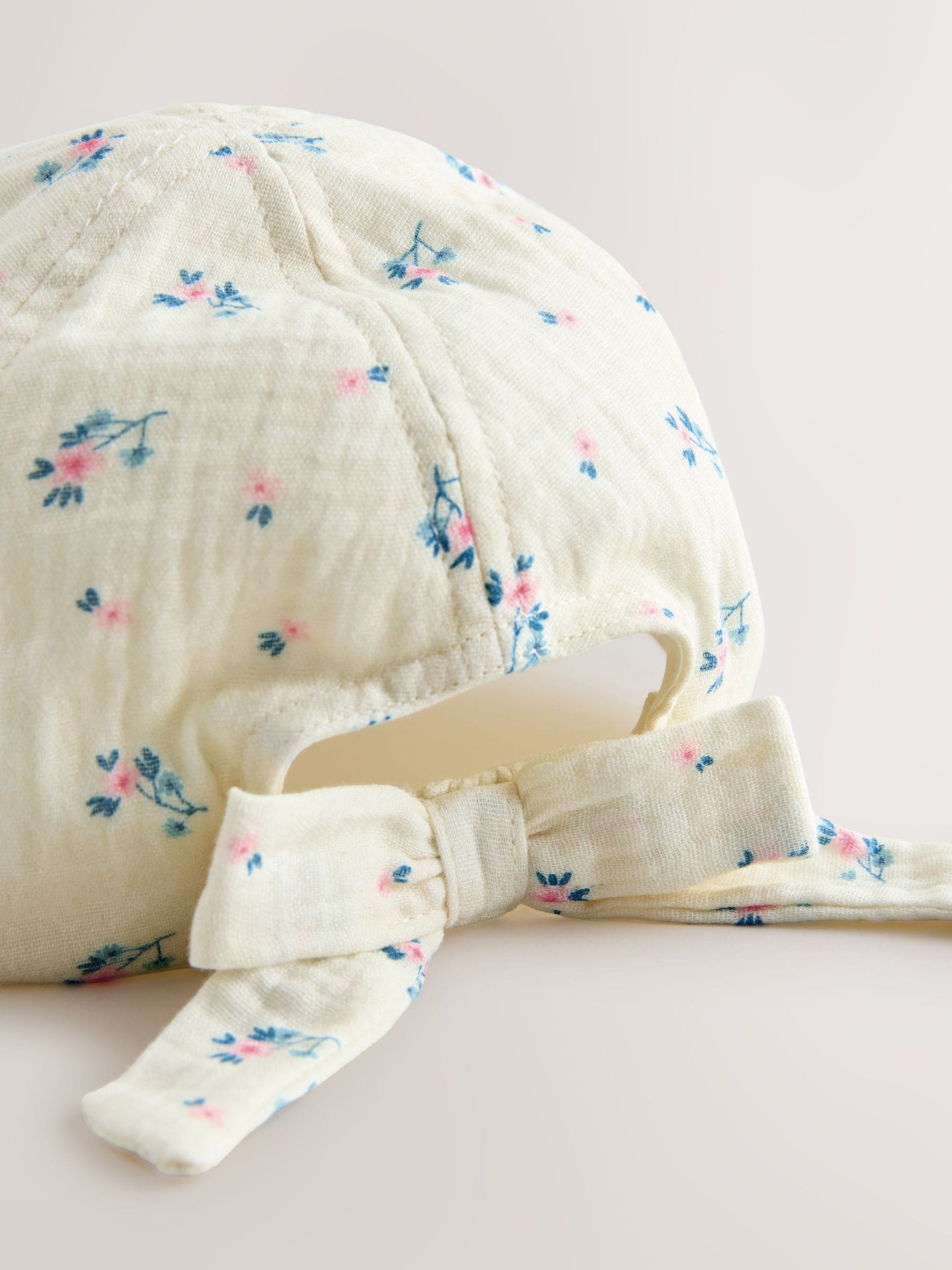 Floral blue bow back cap children's 100% cotton, imported from the UK
