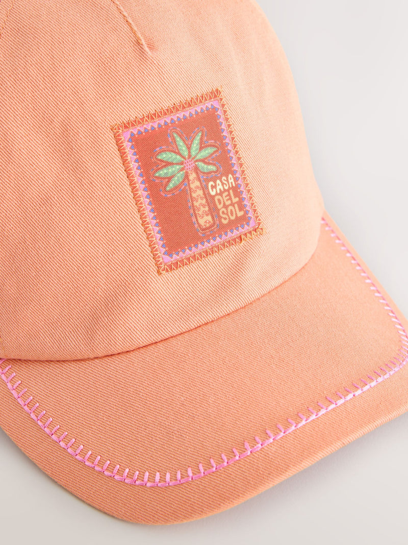 Children's orange baseball cap with scarf bow back (British brand)