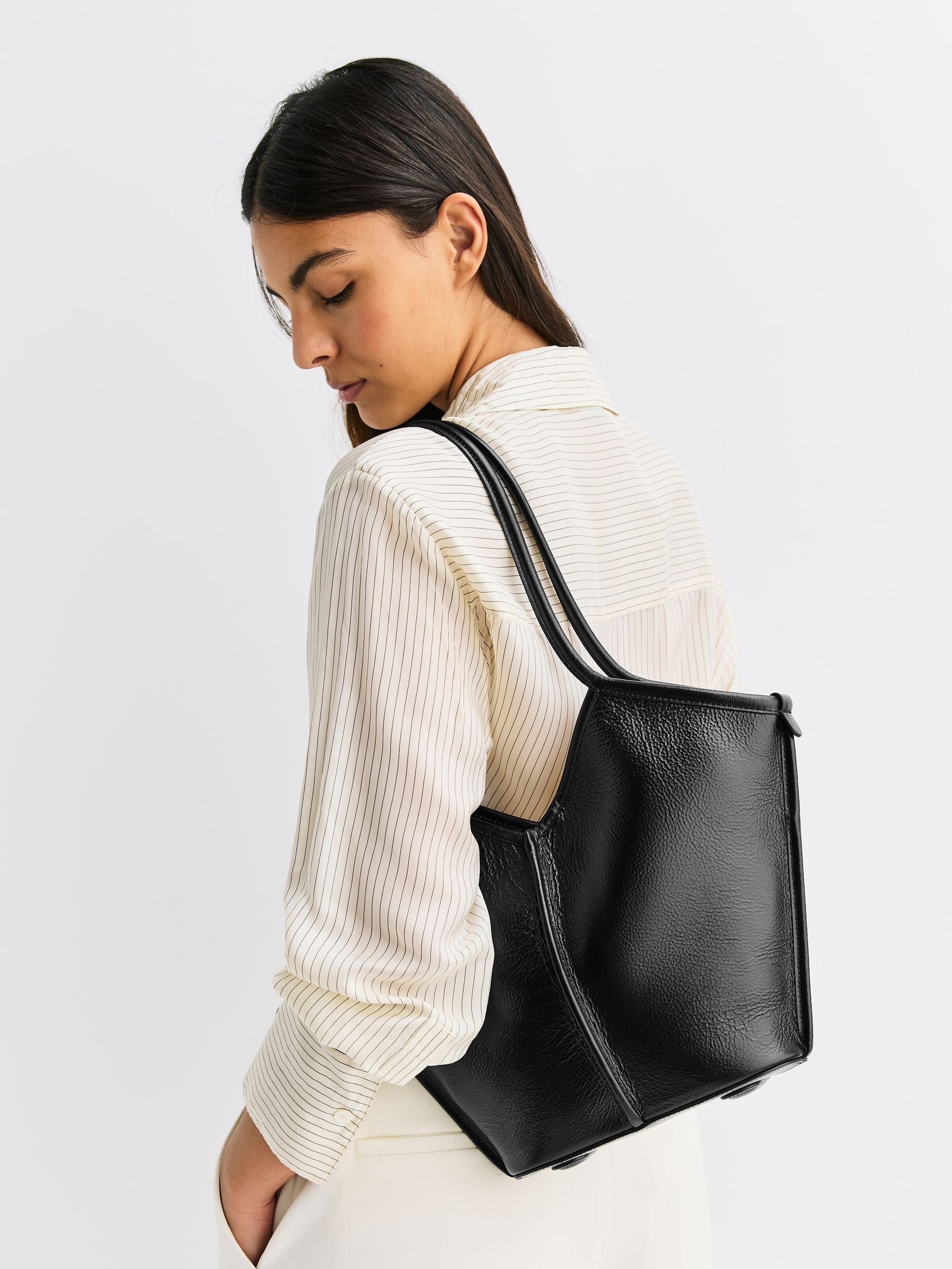 Hereu Studio Calella S shoulder bag in black leather, imported from the UK