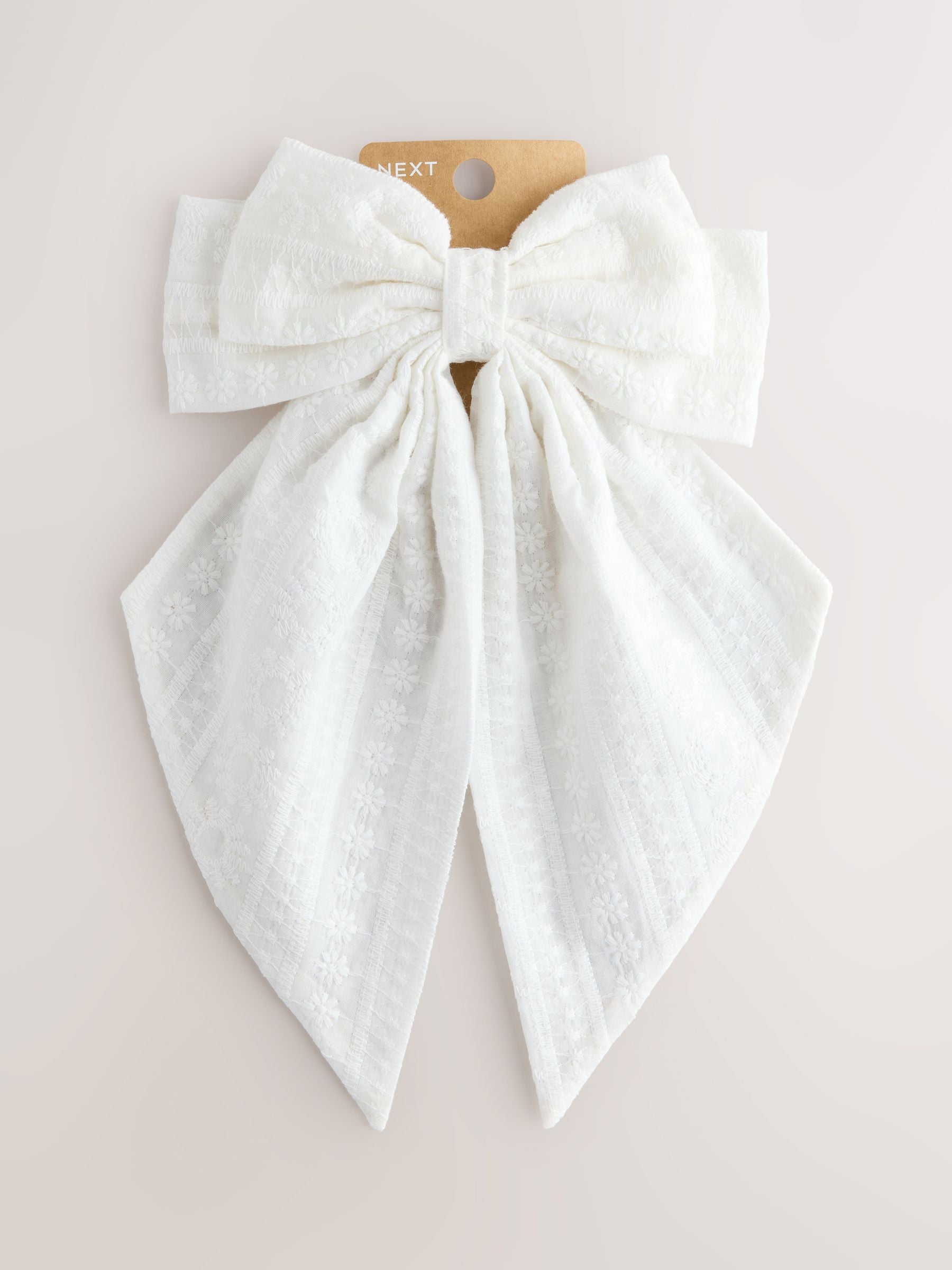 White broderie headband with large bow, UK version