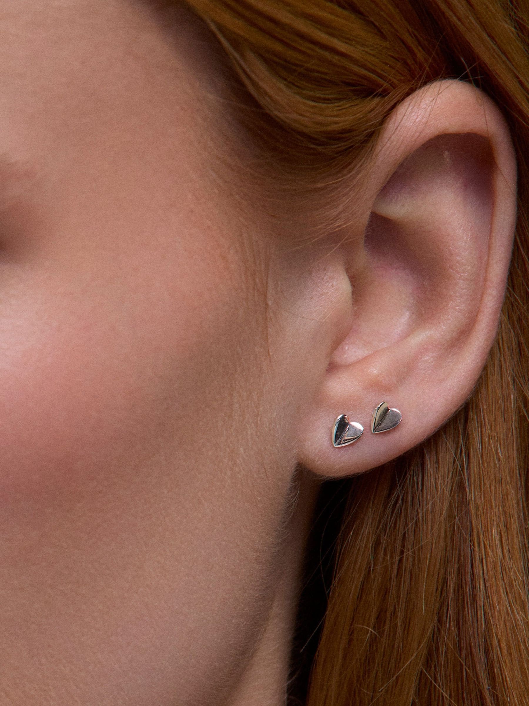 Dinny Hall small silver heart stud earrings, UK version