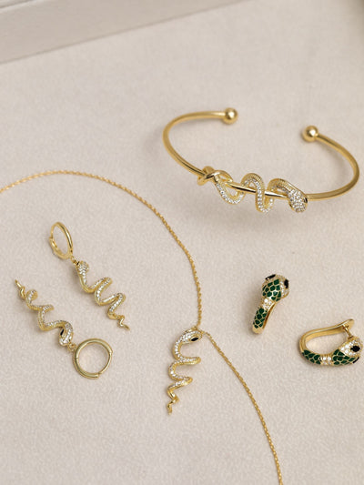 Next Inicio Gold Tone Emerald Snake Hoop Earrings- Buy online at McGrocer