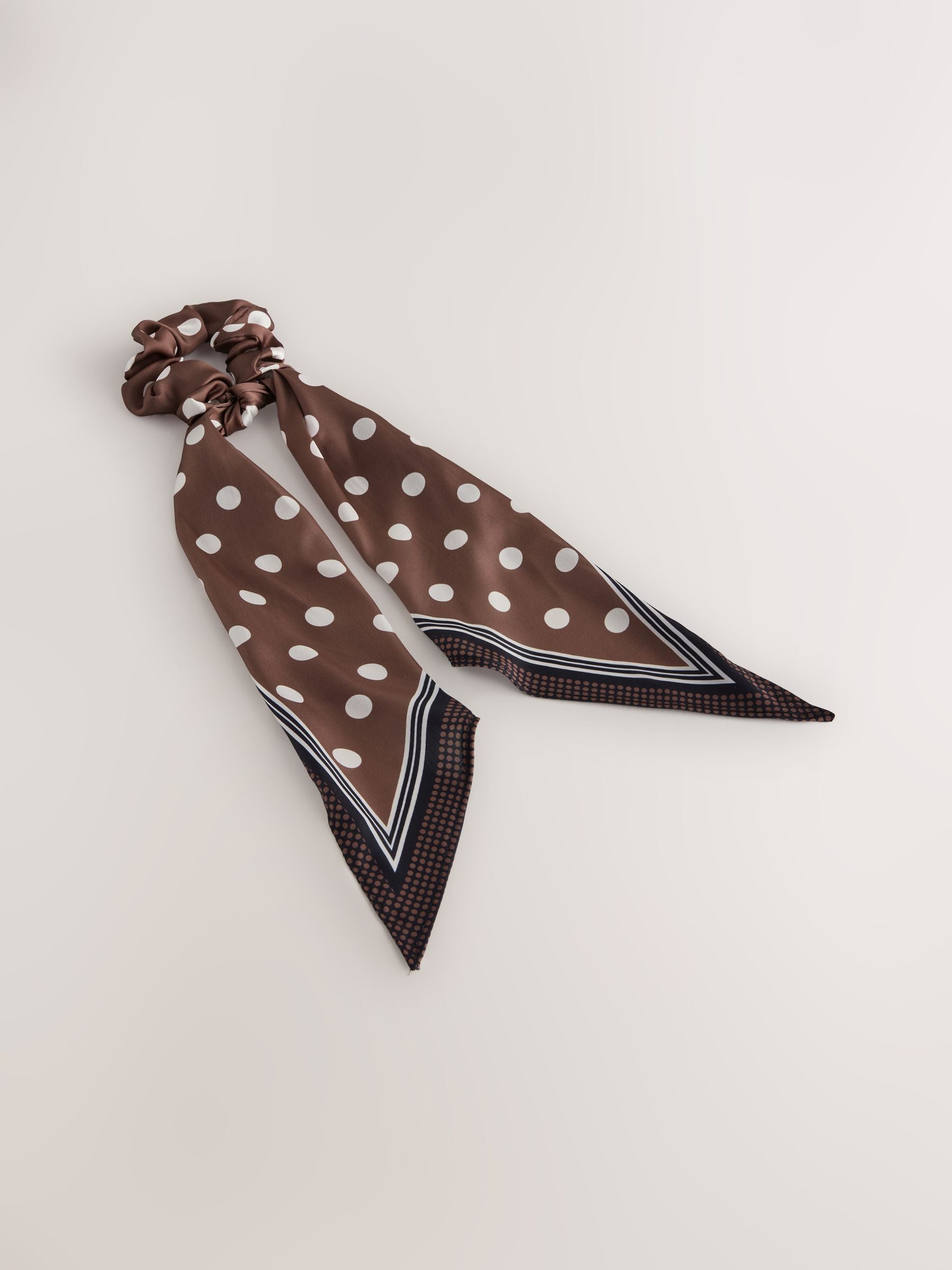 Polka dot scrunchie with tie detail in brown, UK version