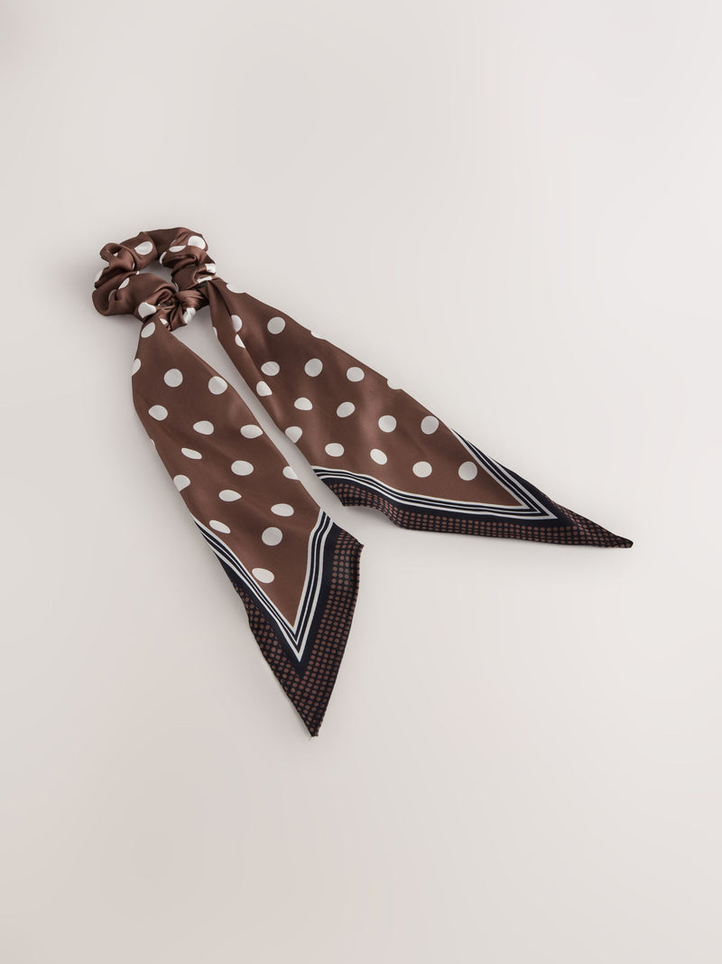 Polka dot scrunchie with tie detail in brown, UK version