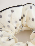 Polka dot scrunchie in white and black (British brand)