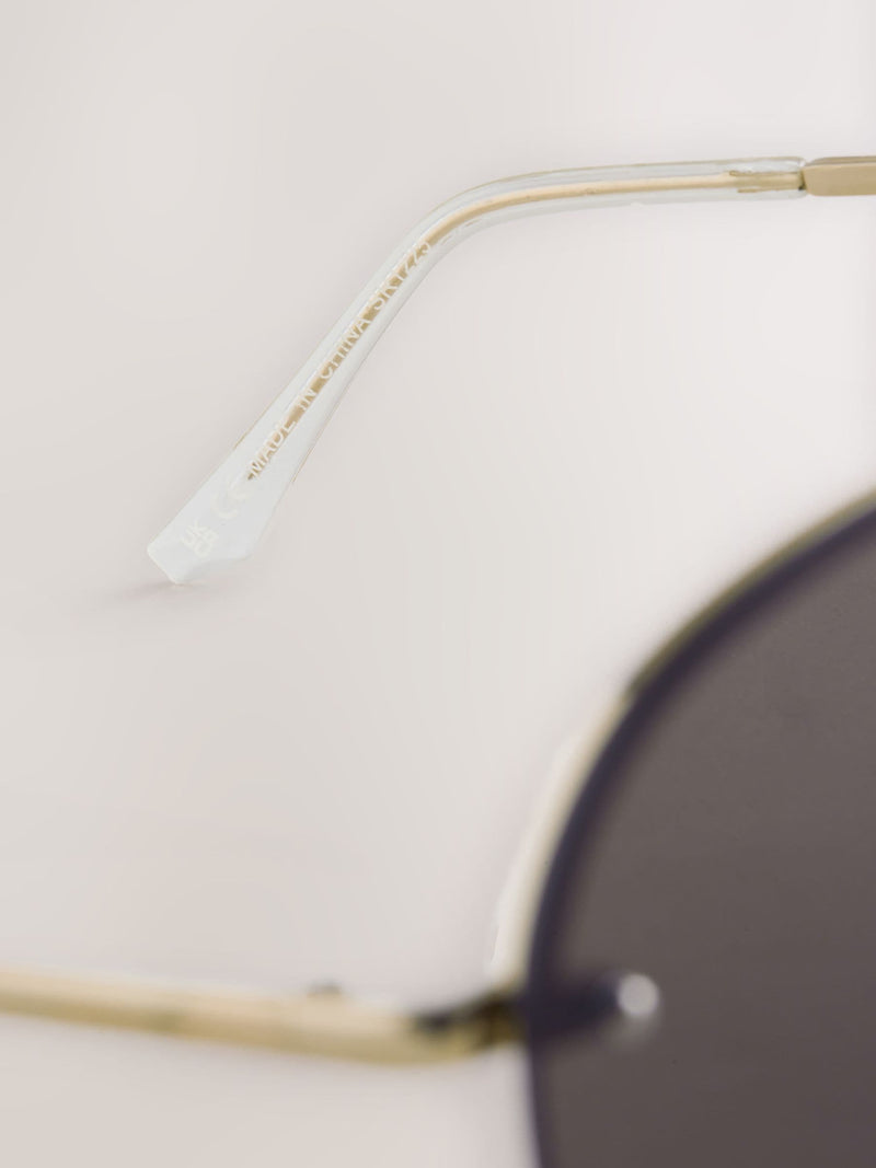 Brown aviator sunglasses with gold-tone metal frame, imported from the UK