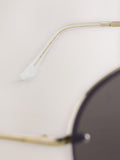Brown aviator sunglasses with gold-tone metal frame, imported from the UK