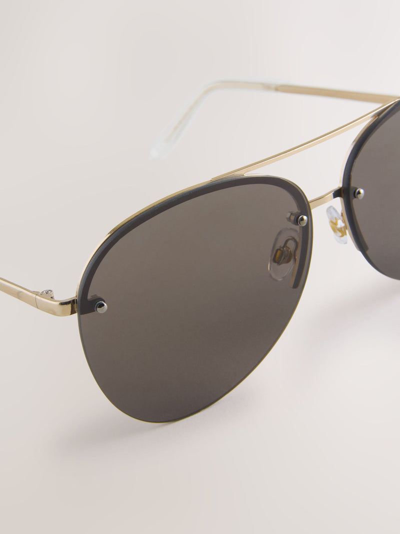 Brown aviator sunglasses with gold-tone metal frame, imported from the UK