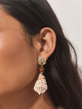Gold tone shell drop earrings with gemstone accents (British brand)