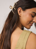 Gold tone metal bow claw clip for hair - British product
