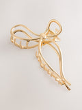 Gold tone metal bow claw clip for hair - British product