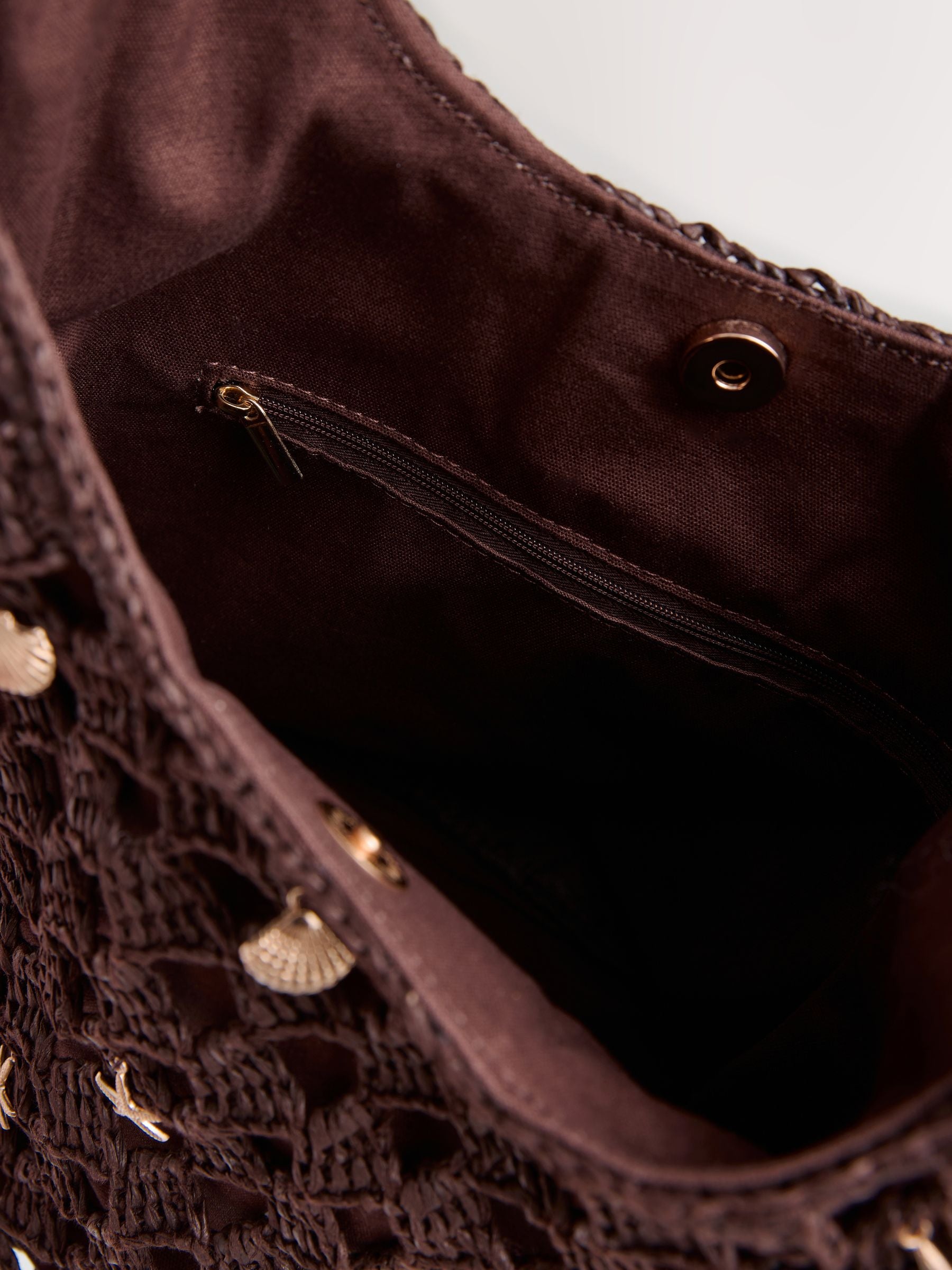 Chocolate brown crochet shoulder bag with shell charms - British product