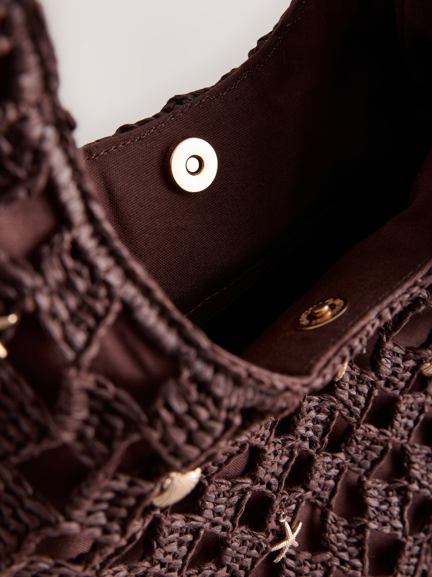 Chocolate brown crochet shoulder bag with shell charms - British product