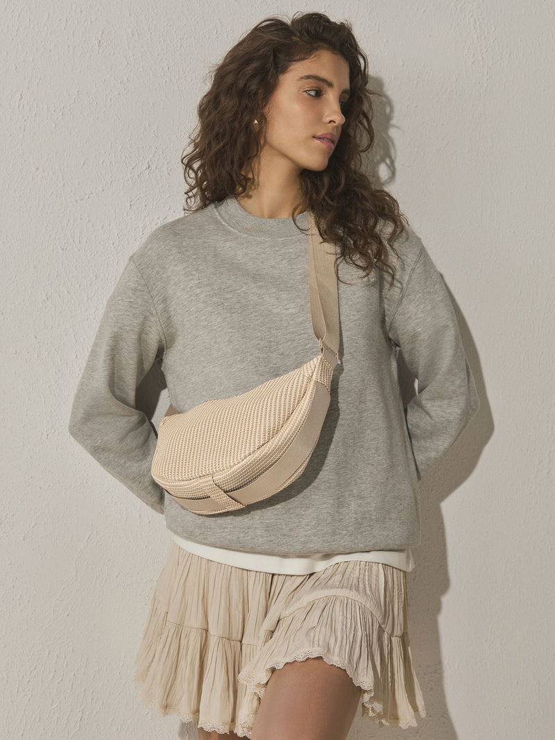 Natural sling cross body bag, imported from the UK