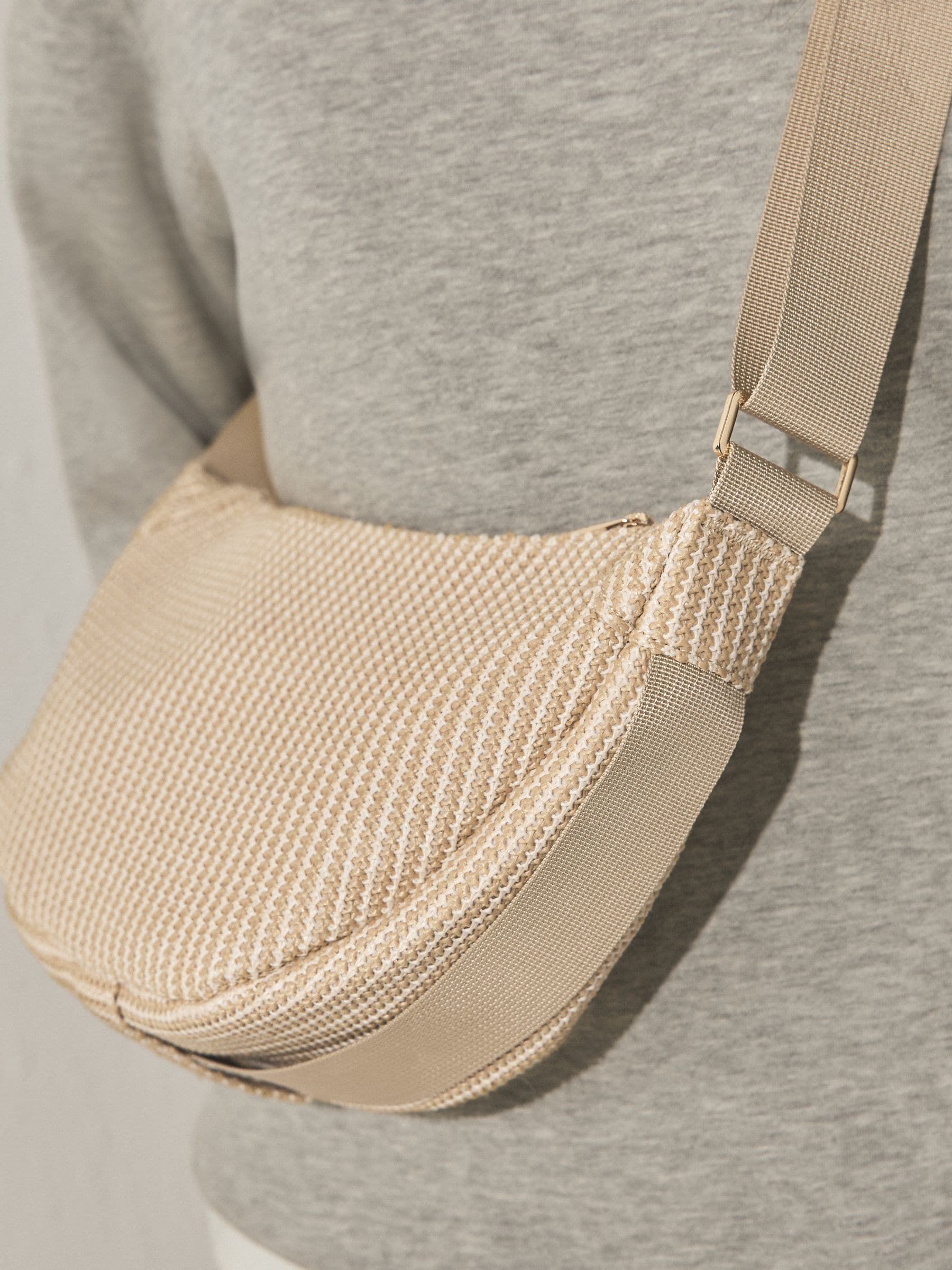 Natural sling cross body bag, imported from the UK