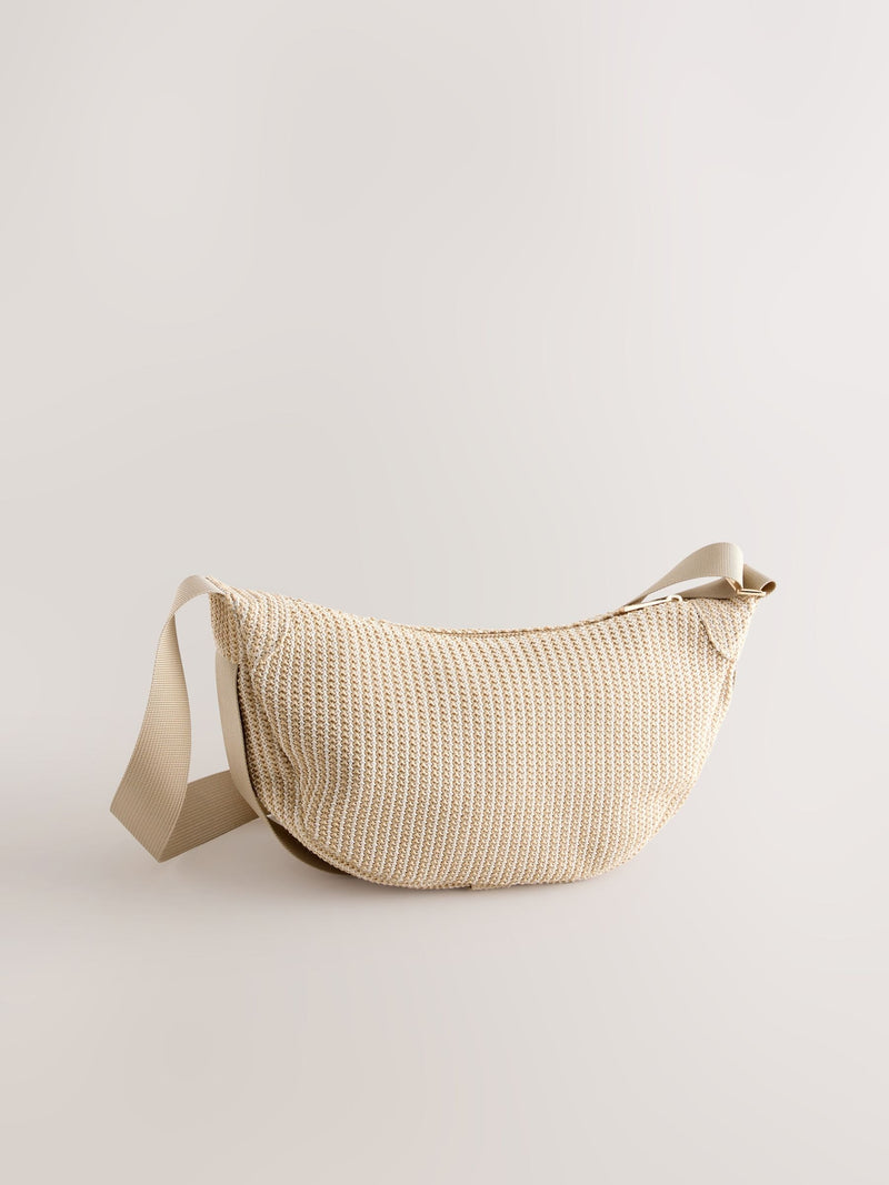 Natural sling cross body bag, imported from the UK