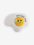 Father's Day cracking egg cushion in ochre yellow, imported from the UK