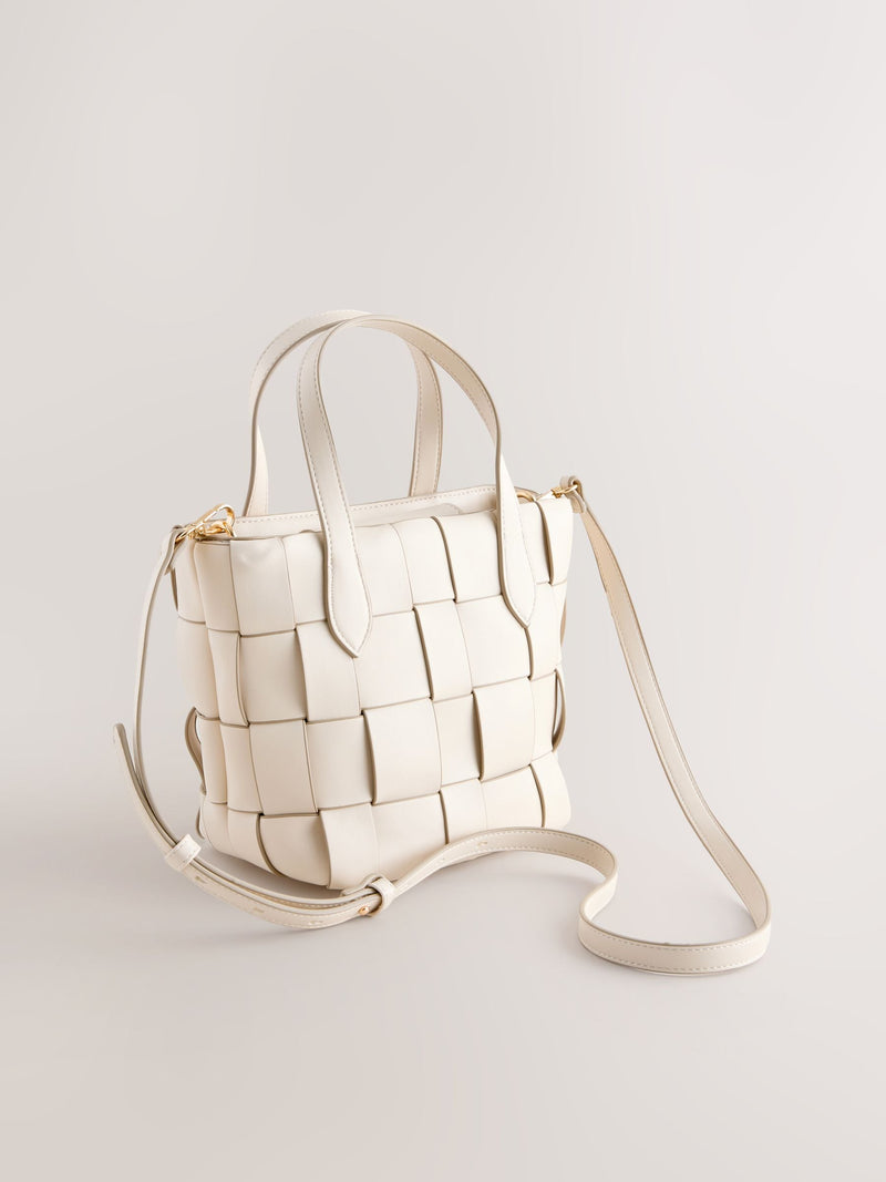 Bone Weave hand held bag with woven texture and recycled lining, imported from the UK