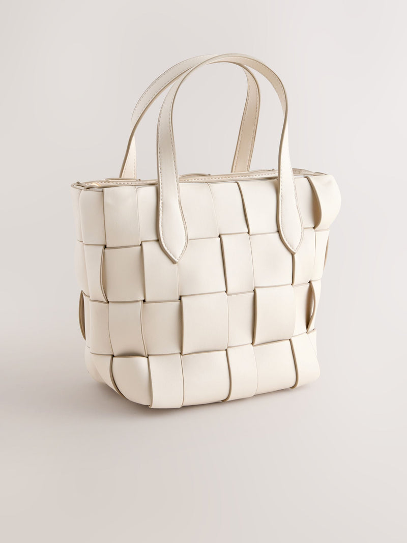 Bone Weave hand held bag with woven texture and recycled lining, imported from the UK