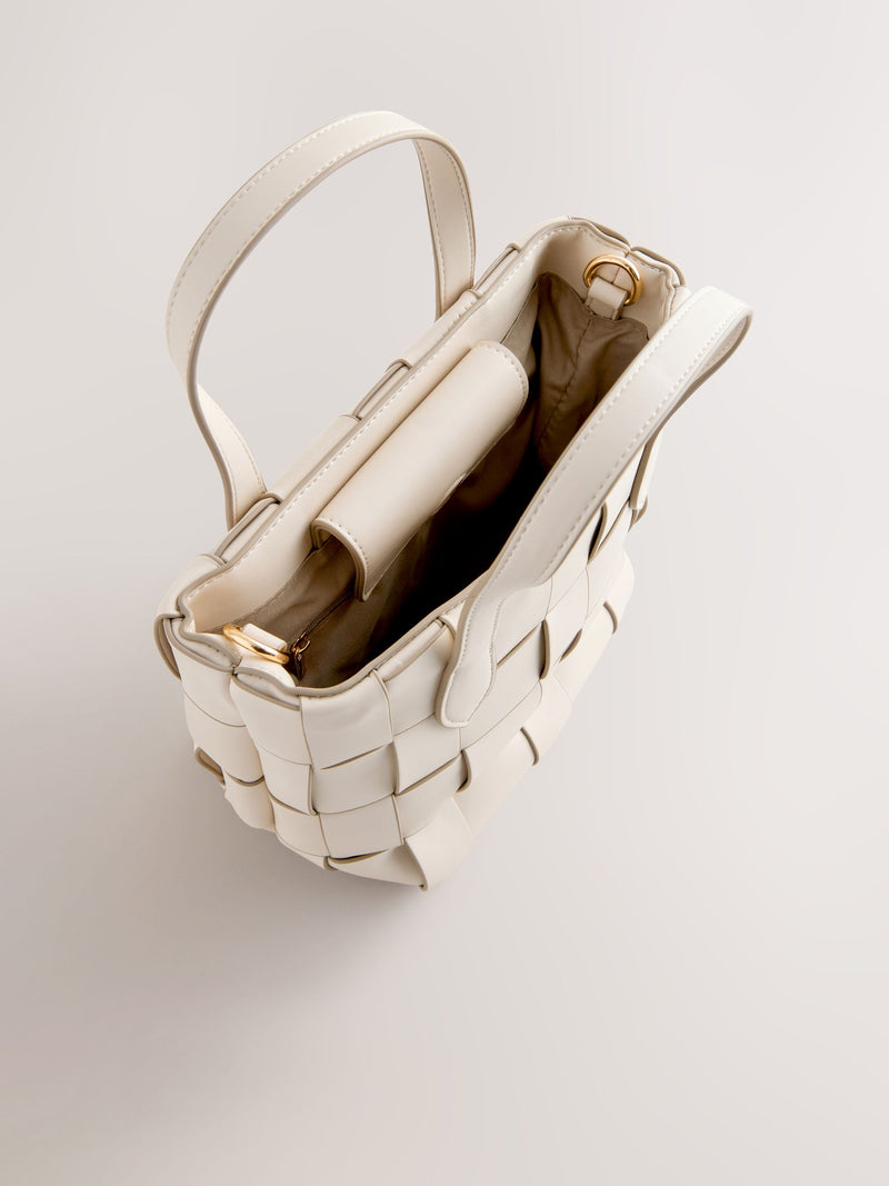 Bone Weave hand held bag with woven texture and recycled lining, imported from the UK