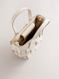 Bone Weave hand held bag with woven texture and recycled lining, imported from the UK