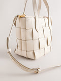 Bone Weave hand held bag with woven texture and recycled lining, imported from the UK