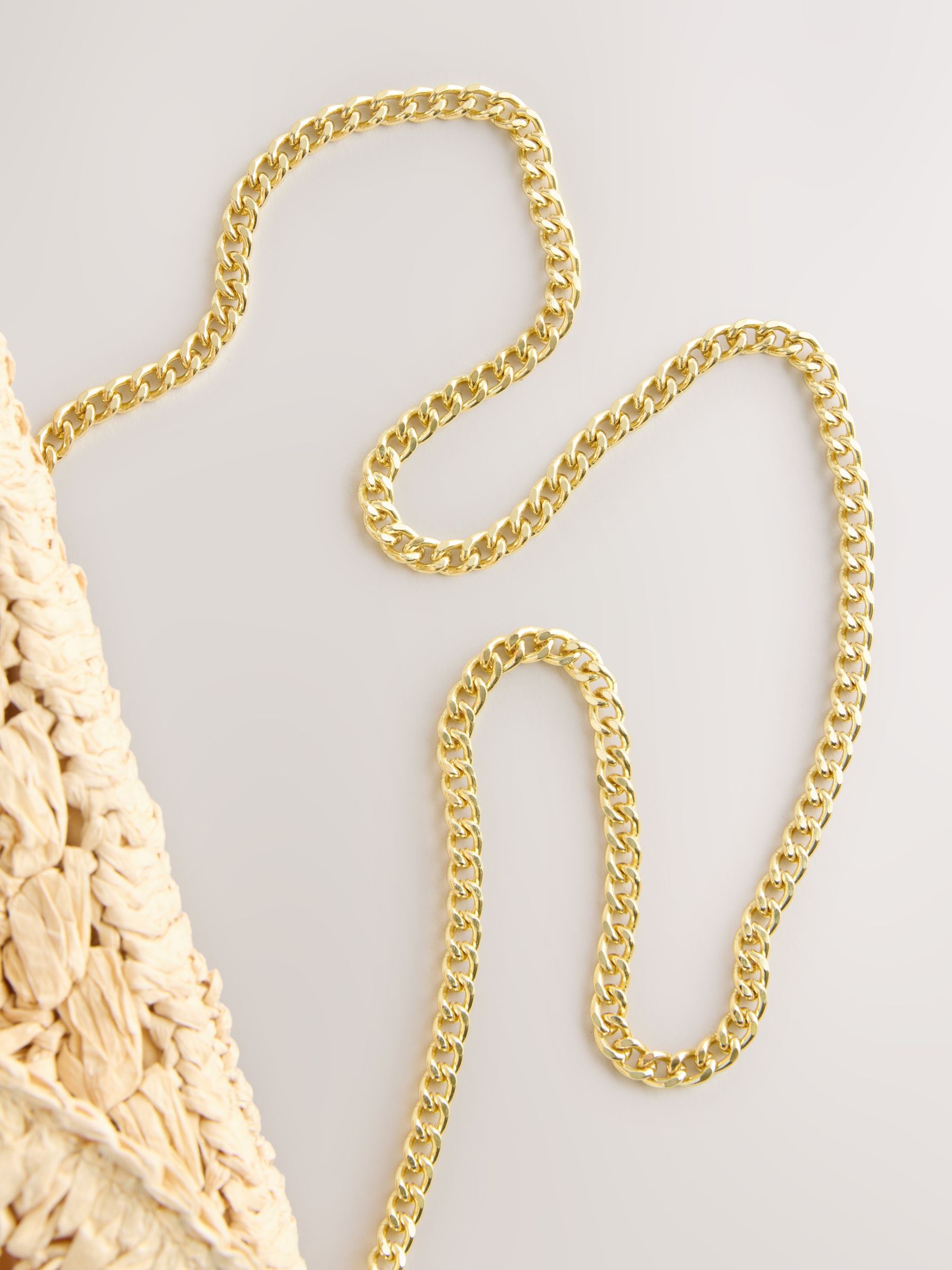 Natural raffia effect clutch bag, UK version