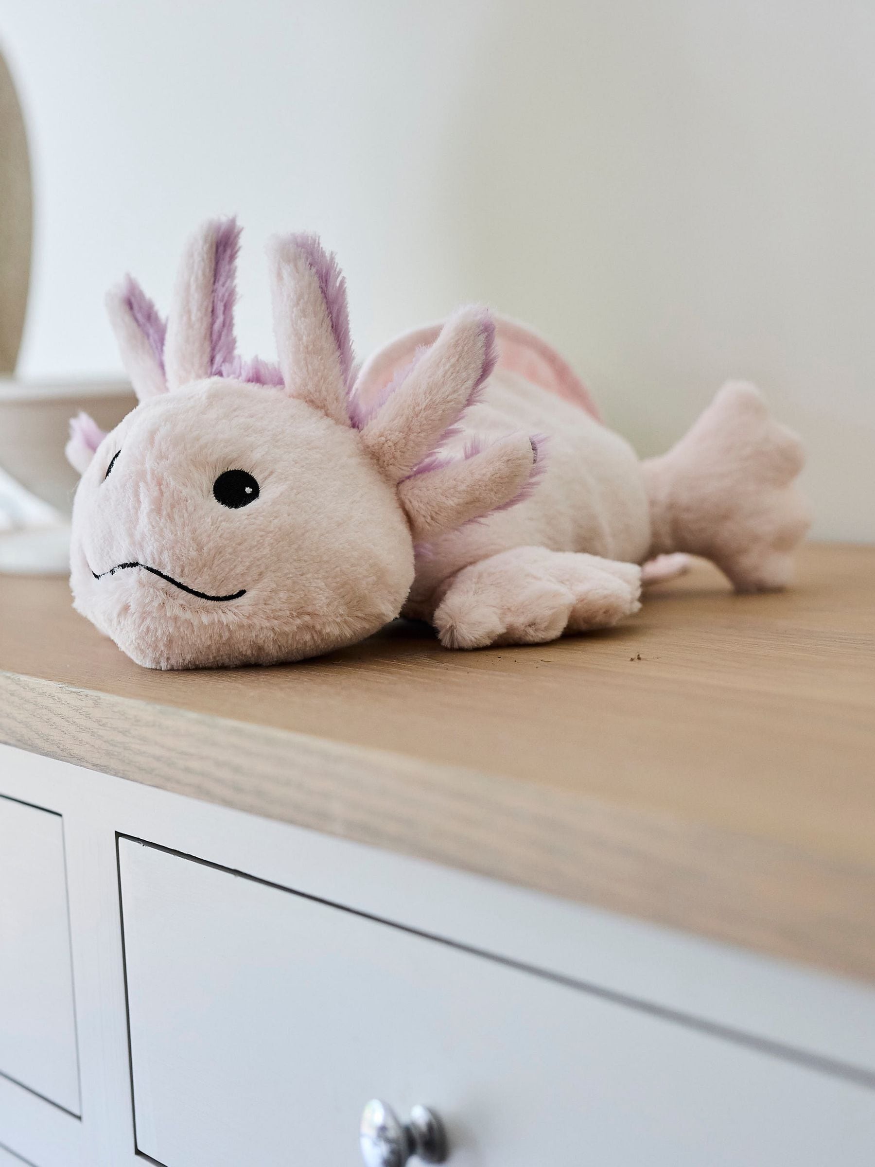 Warmies pink large axolotl heatable soft toy, imported from the UK