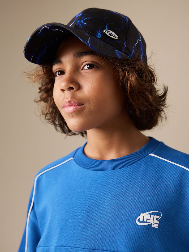 Baseball cap black and blue lightning bolt 3-16yrs, imported from the UK