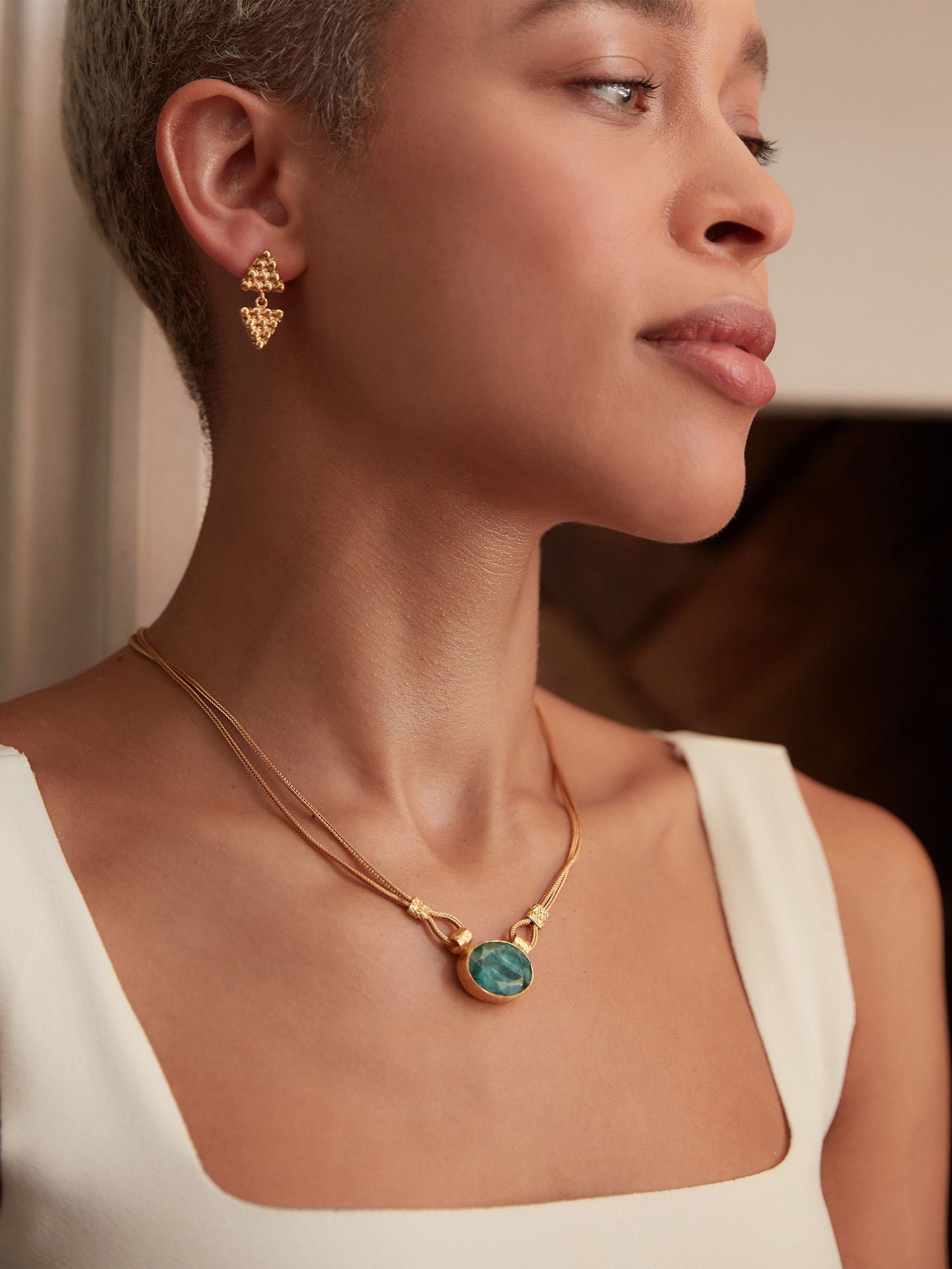 Ottoman Hands gold tone Daphne emerald chain necklace (British brand)
