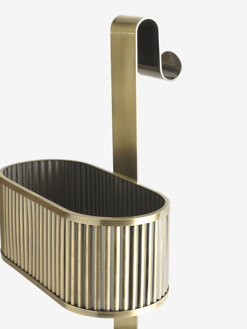 Gold ribbed shower caddy made from iron, imported from the UK