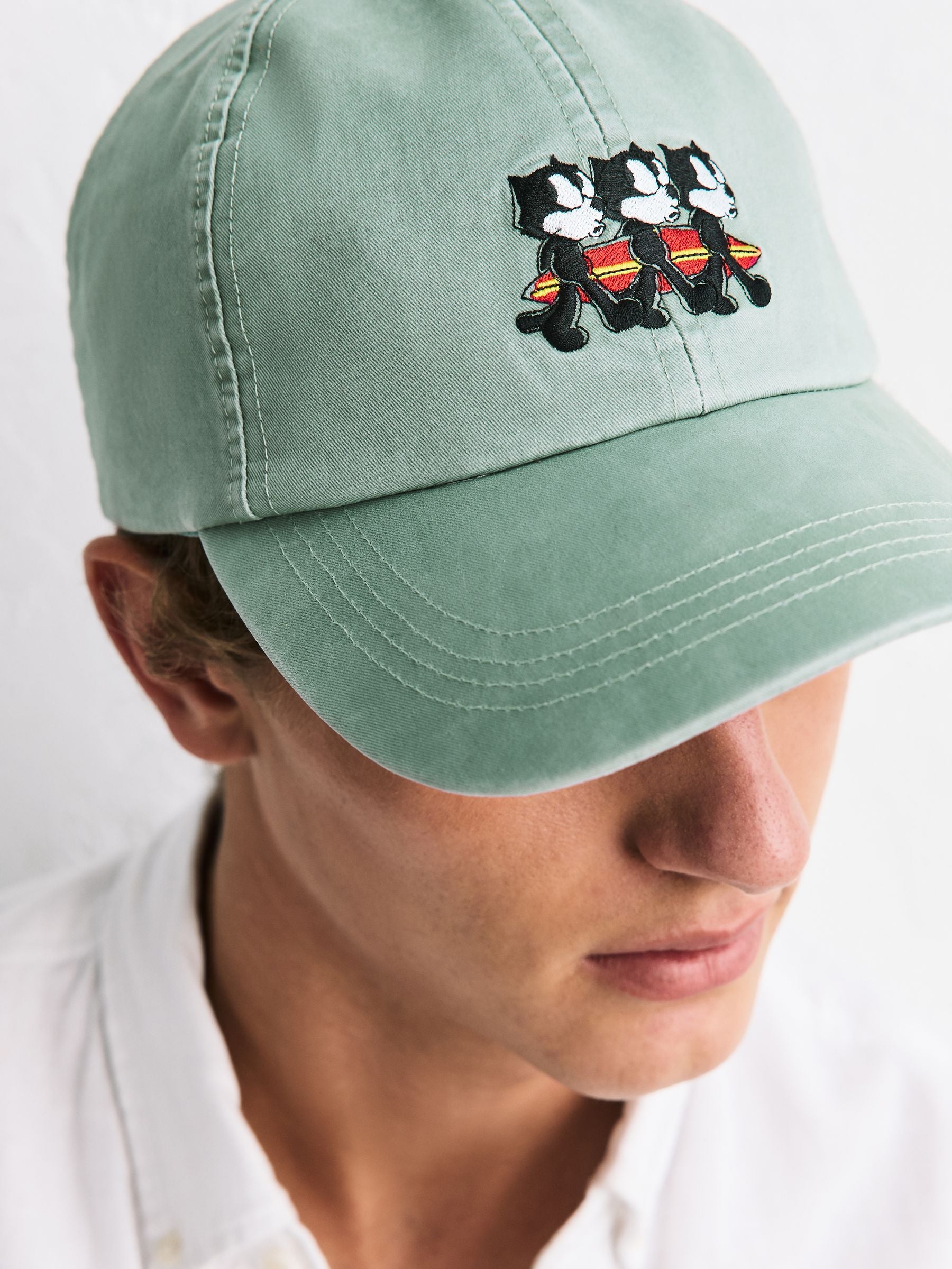 Felix sage green embroidery cap - British product