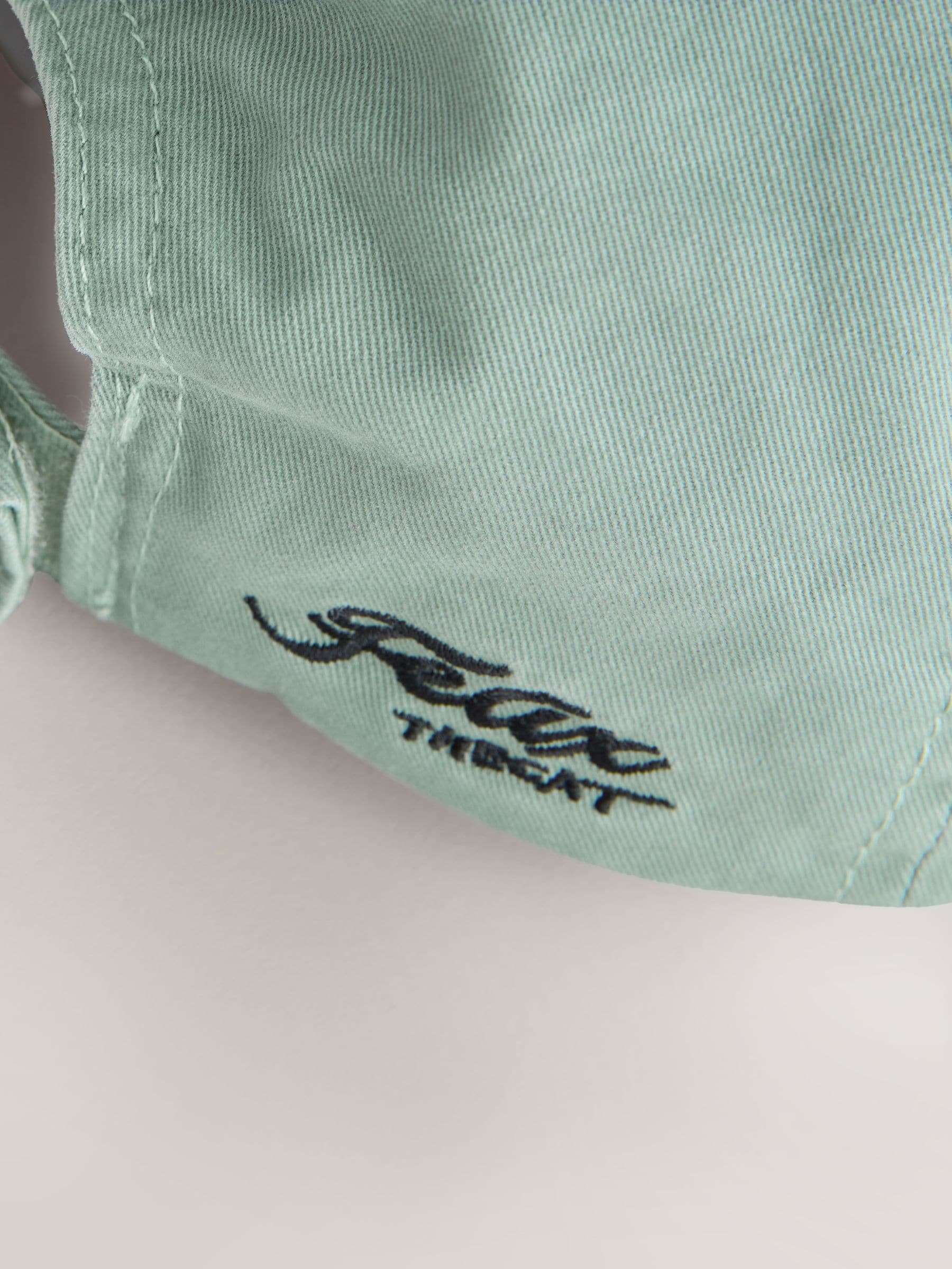 Felix sage green embroidery cap - British product