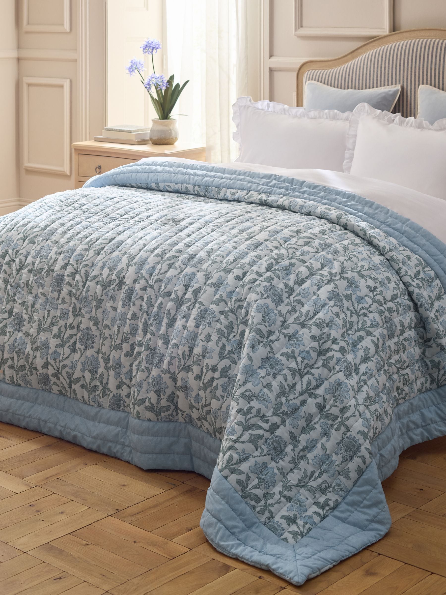 Blue floral quilted bedspread, UK version