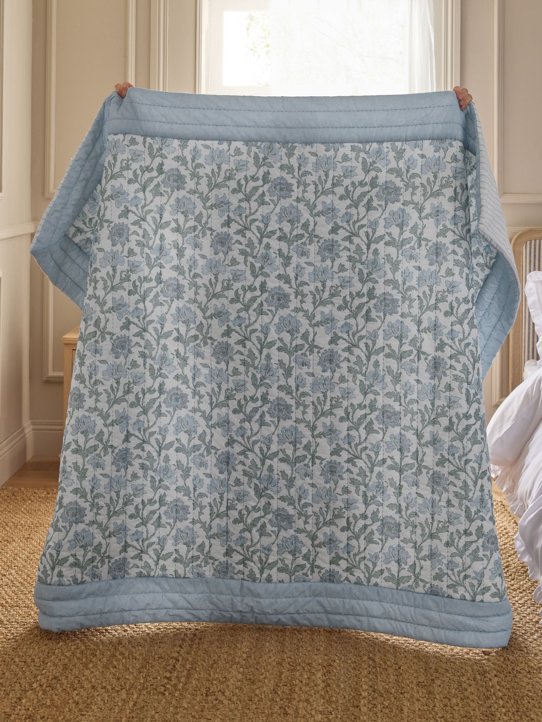 Blue floral quilted bedspread, UK version