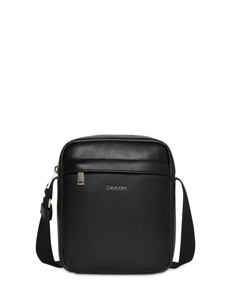Calvin Klein black raised reporter bag (British brand)