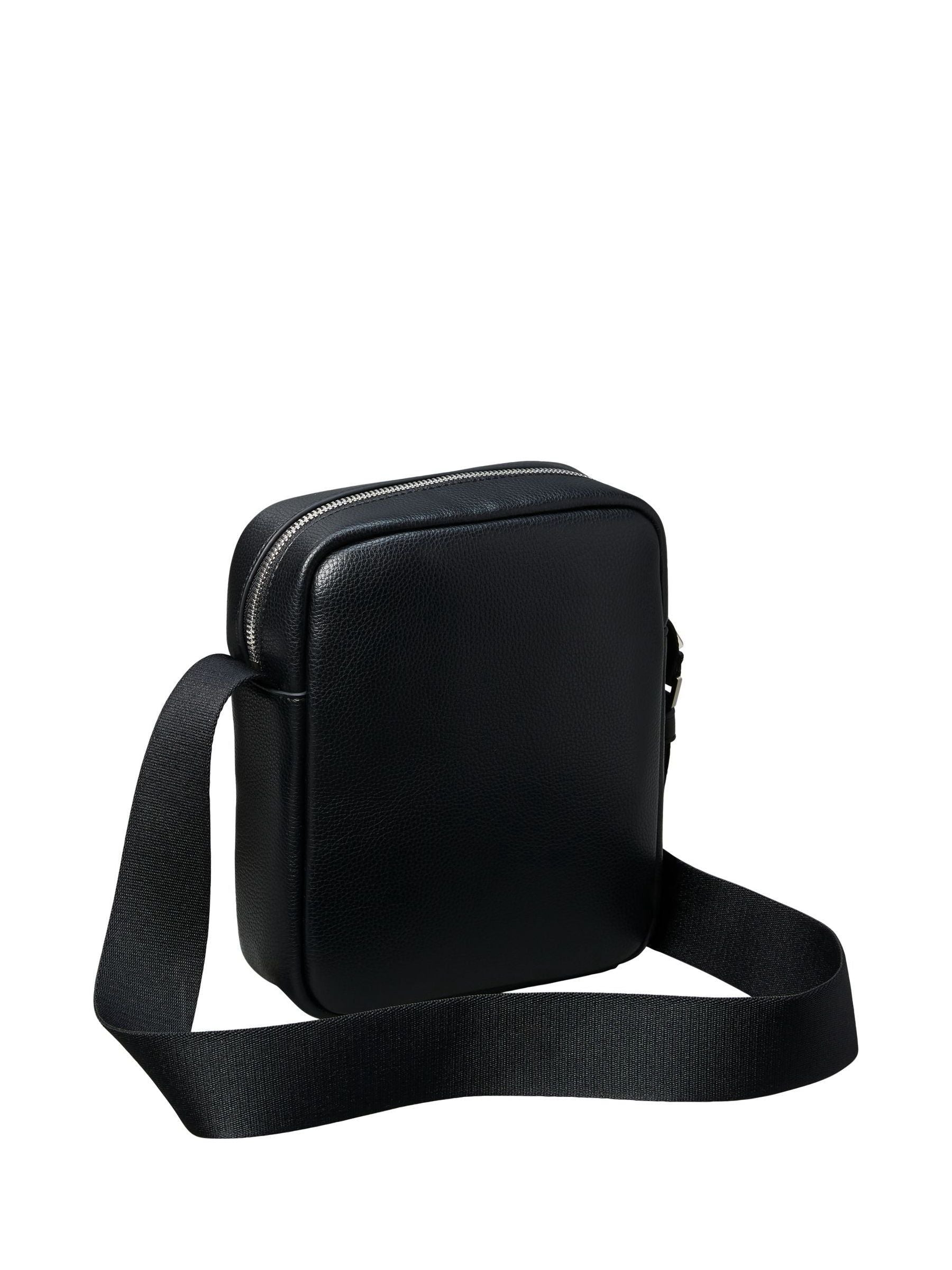 Calvin Klein black raised reporter bag (British brand)
