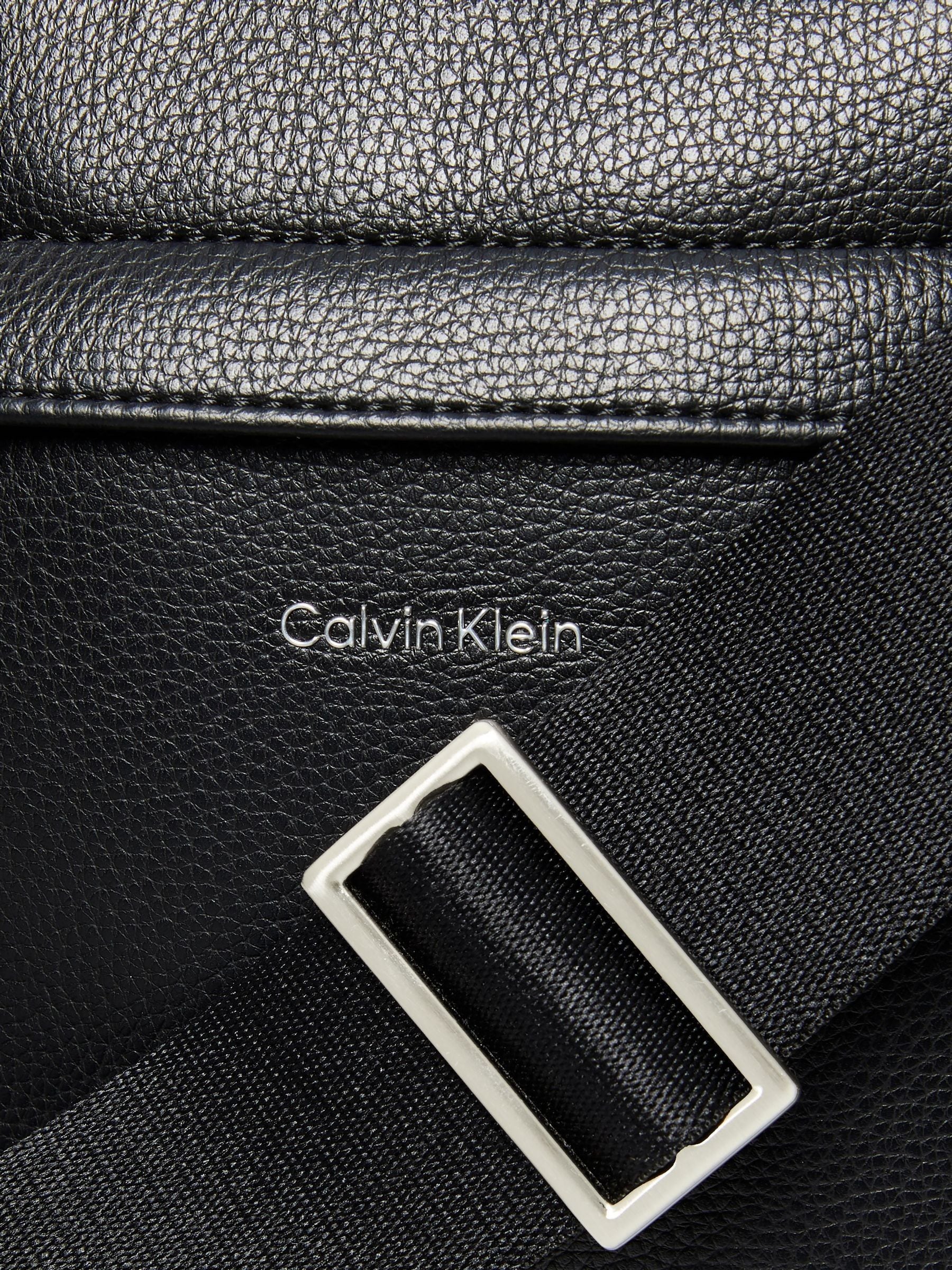 Calvin Klein black raised reporter bag (British brand)