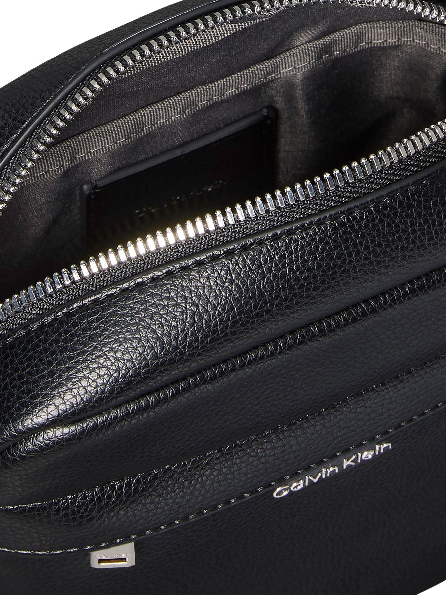 Calvin Klein black raised reporter bag (British brand)