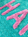 Mooky Mats turquoise pink happy slogan bath mat 50x80cm UK version