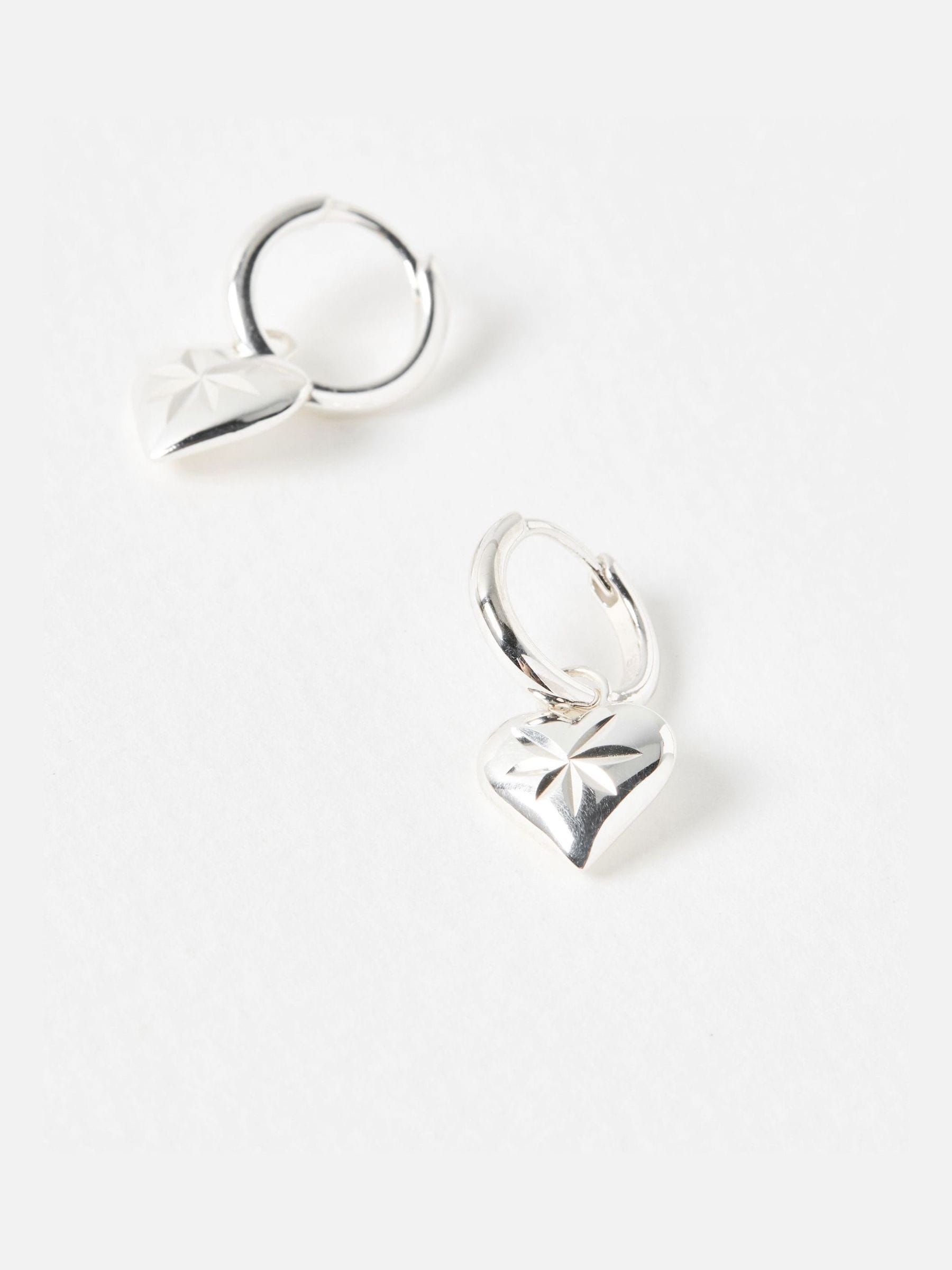 Oliver Bonas Cora hoop earrings with heart charm, imported from the UK