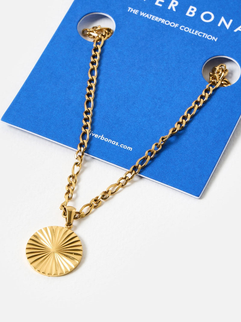 Oliver Bonas gold tone etched disc pendant necklace, imported from the UK