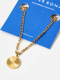Oliver Bonas gold tone etched disc pendant necklace, imported from the UK