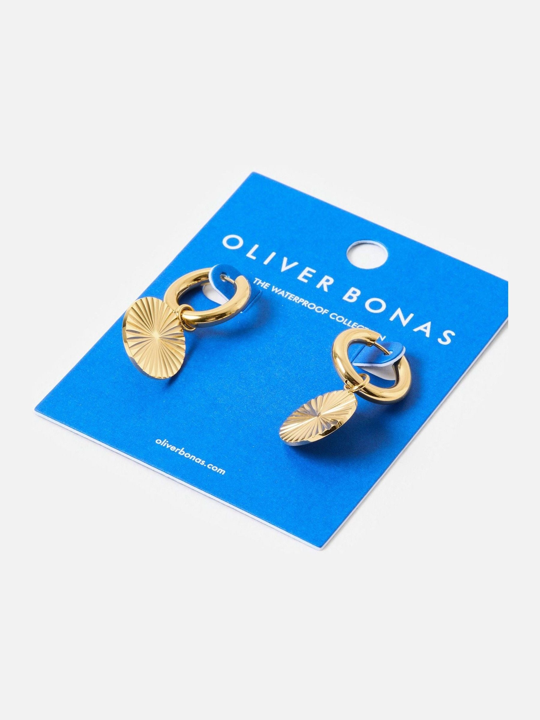 Oliver Bonas gold tone waterproof drop earrings, imported from the UK