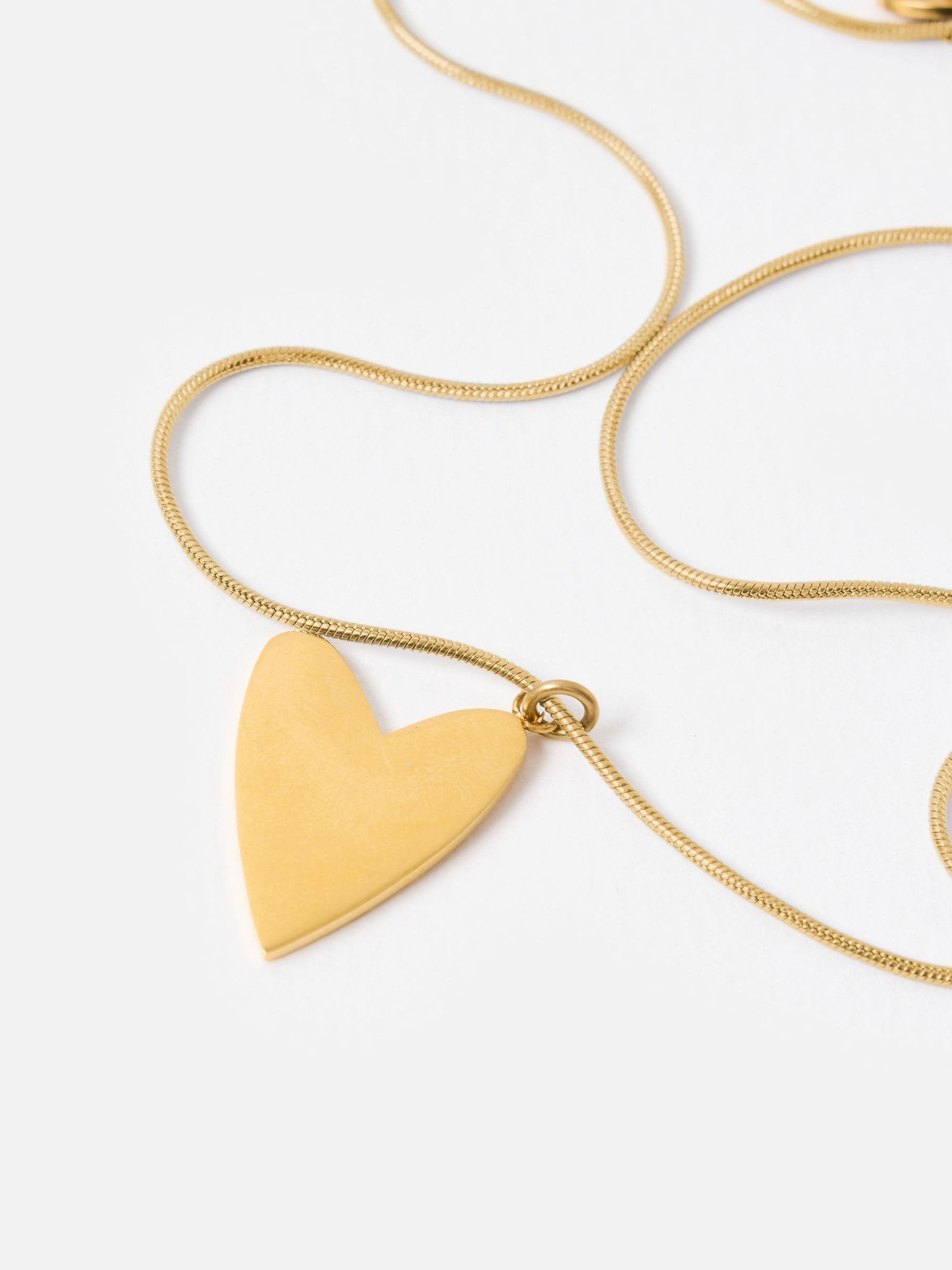 Oliver Bonas gold tone heart pendant necklace (British brand)